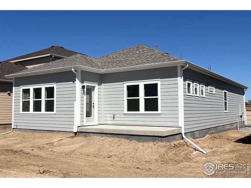 Front exterior of a new home in Bloom, Severance, CO, highlighting curb appeal (Image 2).