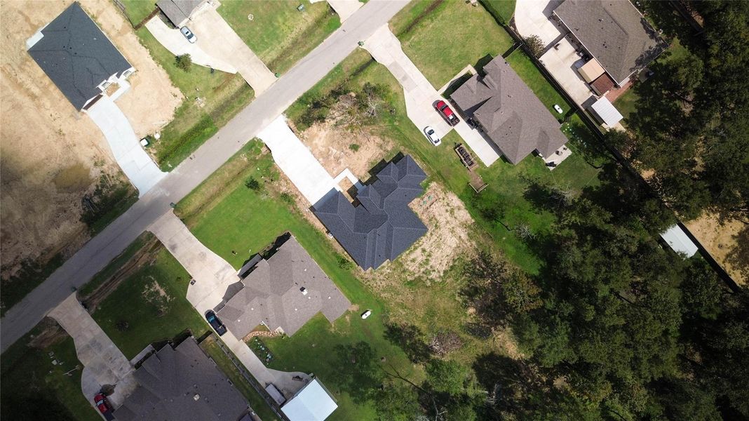 Front exterior of a new home in , Dayton, TX, highlighting curb appeal (Image 3). Front exterior of a new home in , Dayton, TX, highlighting curb appeal (Image 3).