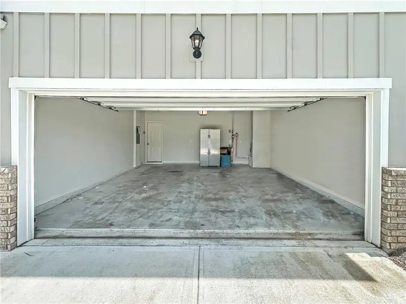 Exterior details and patio area of a home in Oakhurst Glen, Fairburn (Image 3).