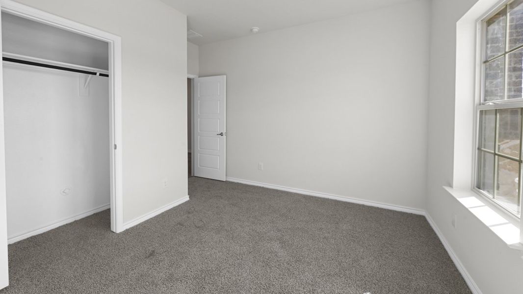 Representative unfurnished interior of a home built from the Tangerine by D.R. Horton in Bel Air Village, Sherman (Image 13).