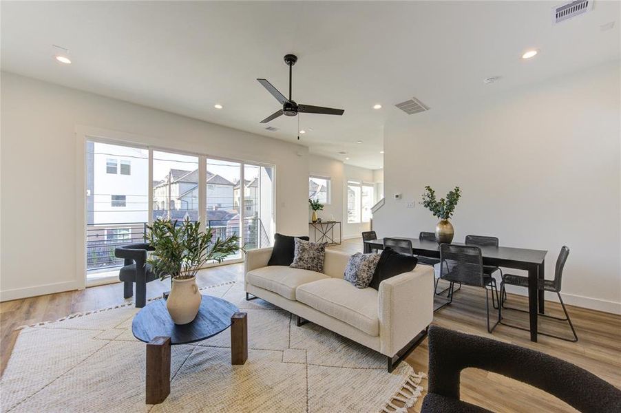 This open floorplan allows the natural light from the kitchen and balcony to entry your combined living room / dining room. This oversized living area is perfect for entertaining or hosting guests!