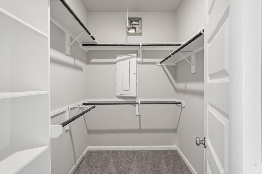 Walk-in closet in primary suite (*Photo not of actual home and used for illustration purposes only.)