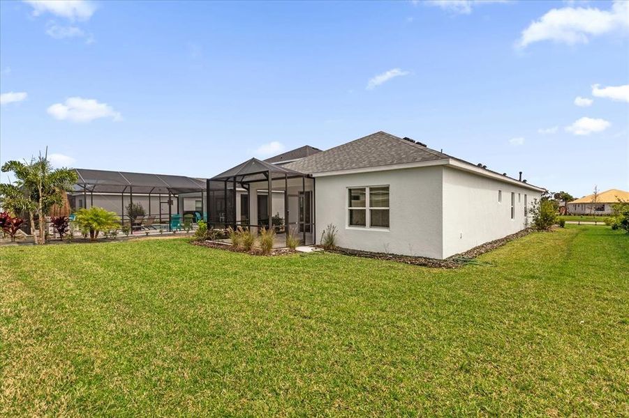 Exterior details and patio area of a home in Canoe Creek, Parrish (Image 23).