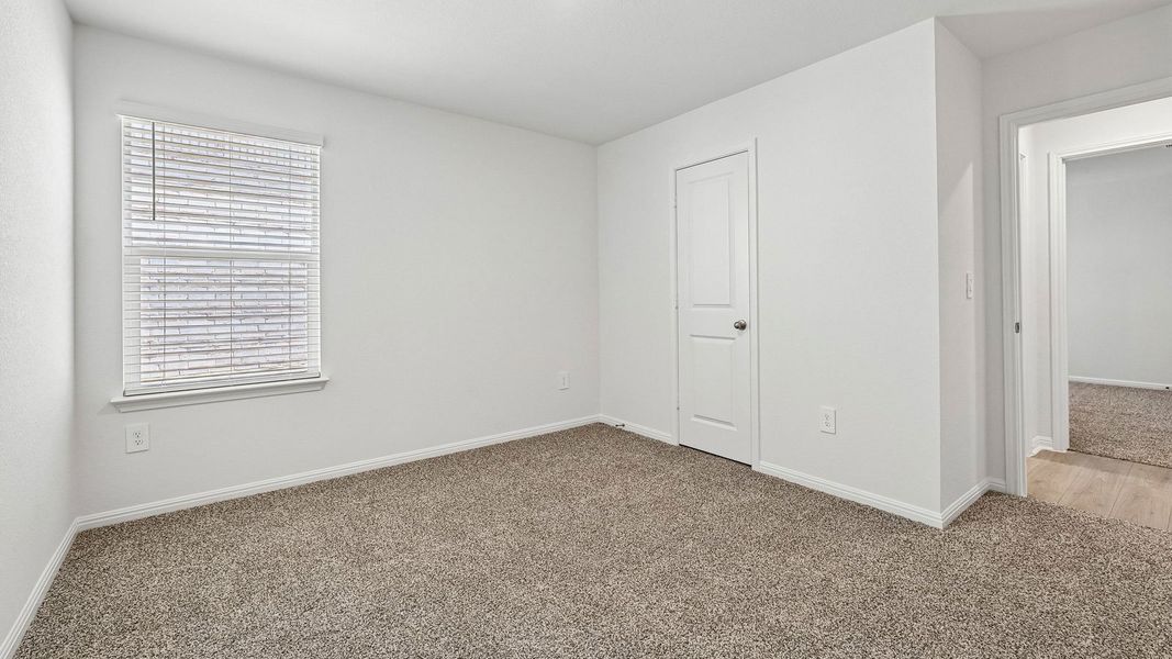 Spacious, unfurnished interior of a new home in Bar W Ranch, Leander (Image 25).