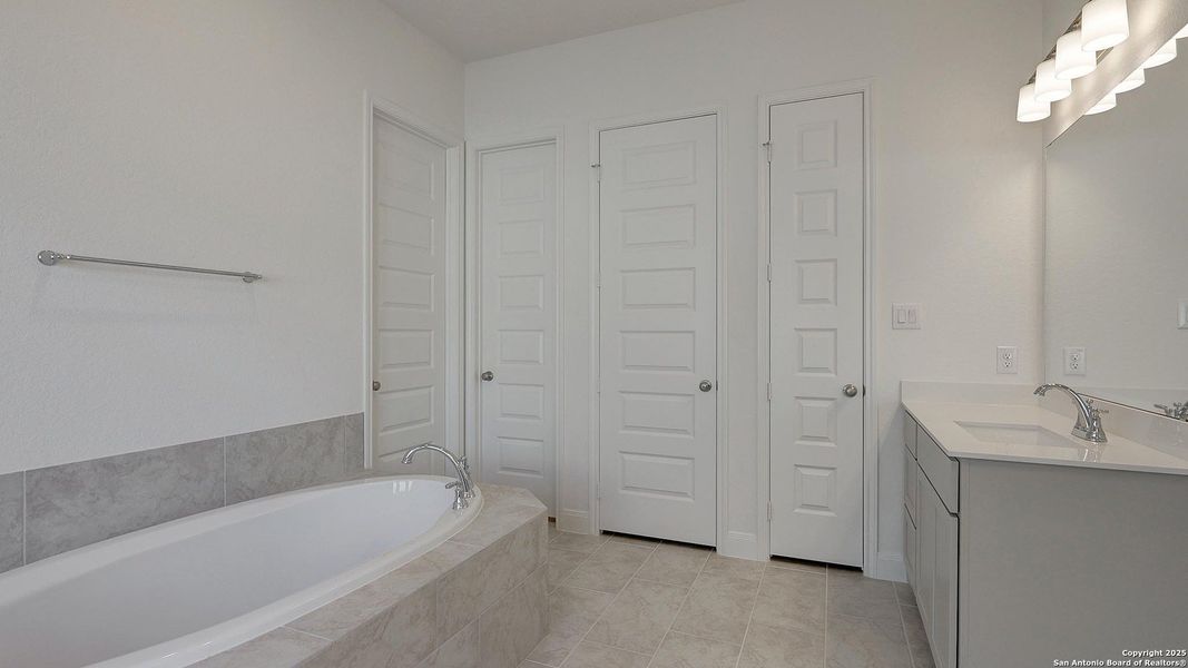 Furnished interior view inside a new home in Kallison Ranch 50', San Antonio (Image 12).