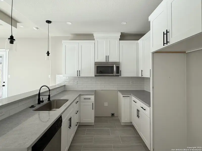 Furnished interior view inside a new home in , San Antonio (Image 4).
