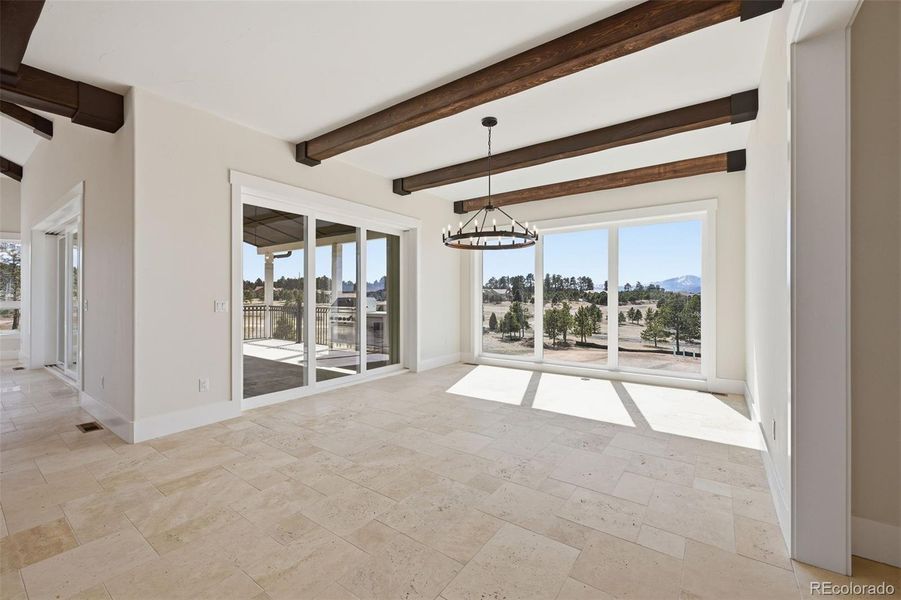 Main Level kitchen/dining area with 2nd window wall on left. Main Level kitchen/dining area with 2nd window wall on left.