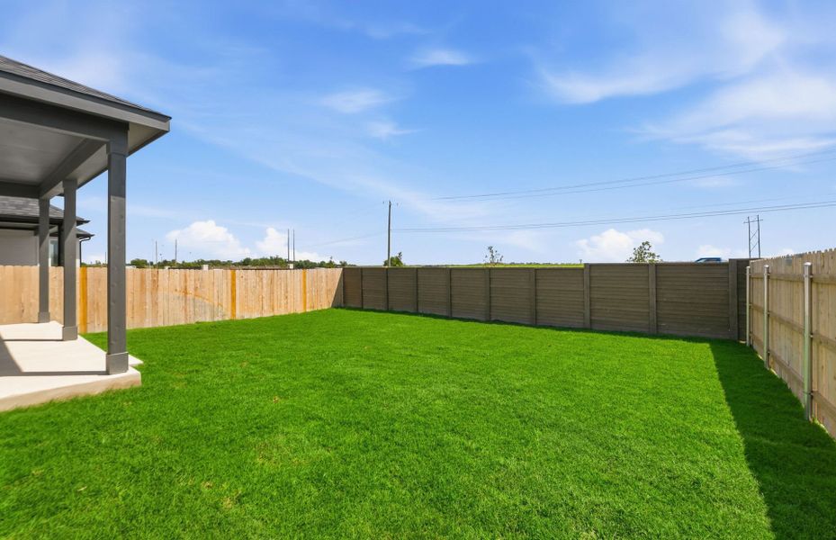 Exterior details and patio area of a home in Kuempel Farms, Pflugerville (Image 29).