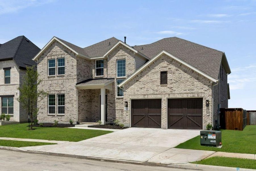 Front exterior of a new home in Cambridge Crossing, Celina, TX, highlighting curb appeal (Image 24). Front exterior of a new home in Cambridge Crossing, Celina, TX, highlighting curb appeal (Image 24).