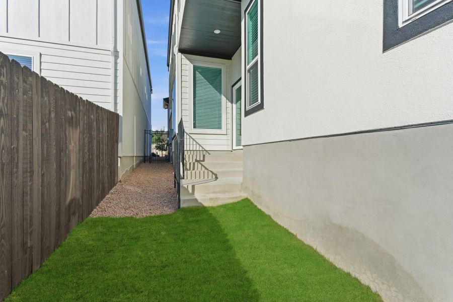 Exterior details and patio area of a home in Centero at Stone Oak, San Antonio (Image 23).