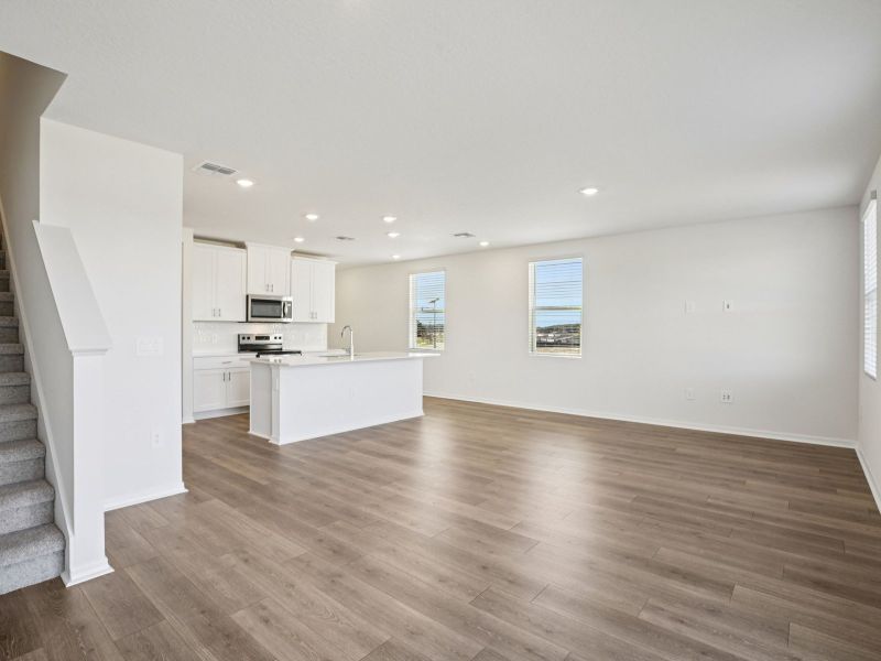 Spacious, unfurnished interior of a new home in The Reserve at Hammock Oaks Townes, Lady Lake (Image 8).