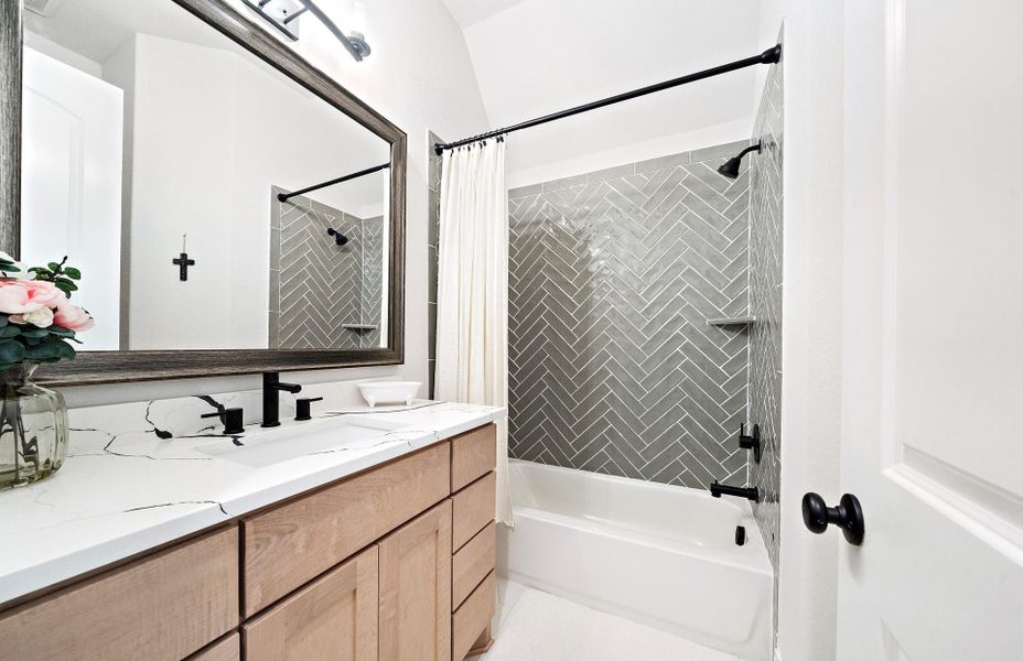 Furnished interior view inside a new home in The Woodlands Hills 65′, Willis (Image 27).