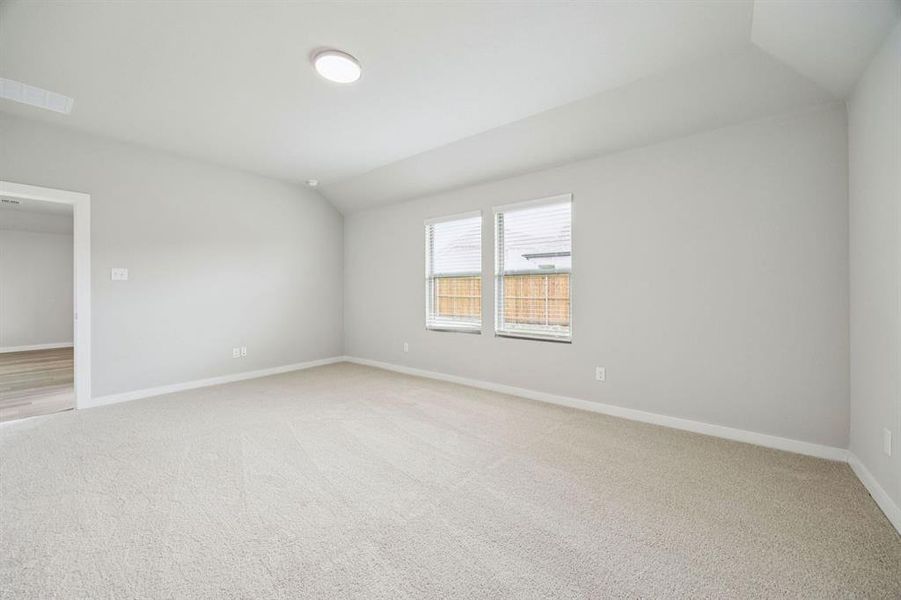 Primary Suite in the Hayden home plan by Trophy Signature Homes – REPRESENTATIVE PHOTO