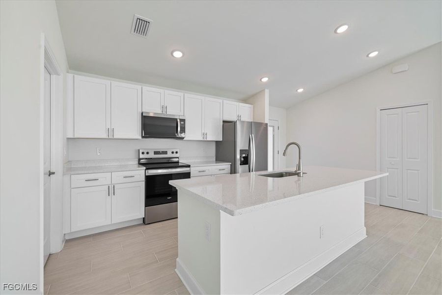 Furnished interior view inside a new home in Cape Coral, Cape Coral (Image 8). Furnished interior view inside a new home in Cape Coral, Cape Coral (Image 8).