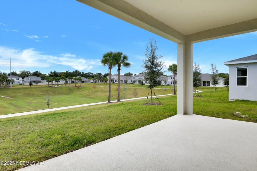 Exterior details and patio area of a home in Seasons at Grandview Gardens, Deland (Image 3).