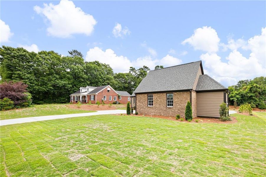 Front exterior of a new home in , Carrollton, GA, highlighting curb appeal (Image 28).