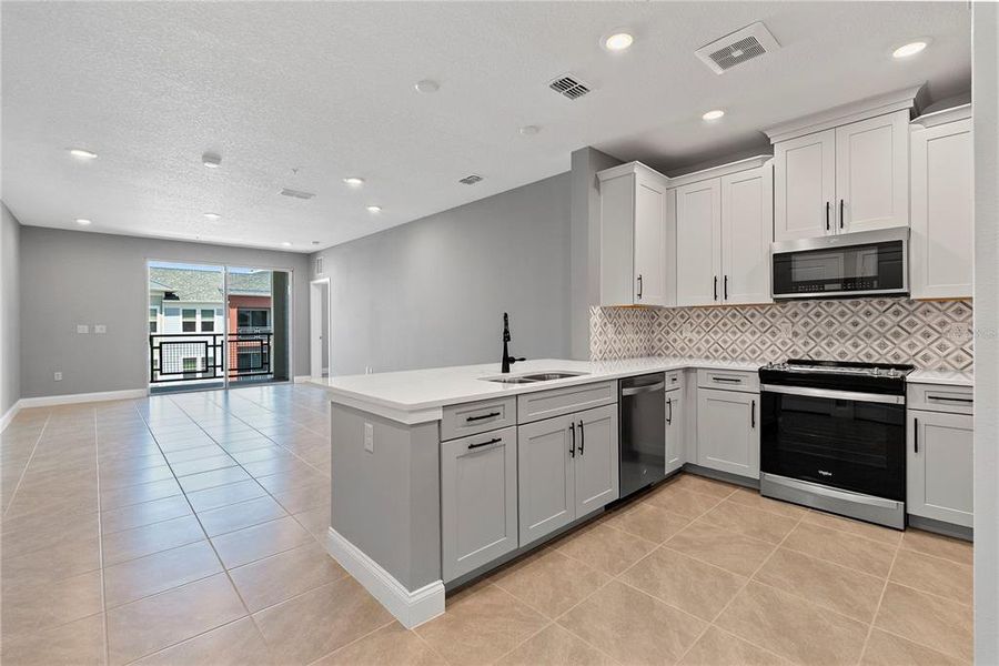 Furnished interior view inside a new home in Gatherings® of Lake Nona, Orlando (Image 4). Furnished interior view inside a new home in Gatherings® of Lake Nona, Orlando (Image 4).