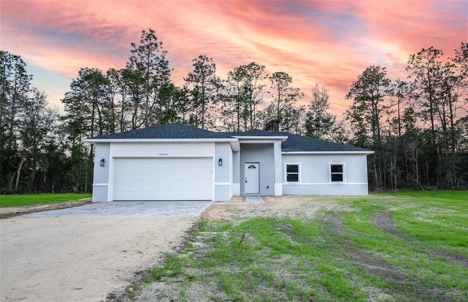 Front exterior of a new home in , Lake Wales, FL, highlighting curb appeal (Image 21).