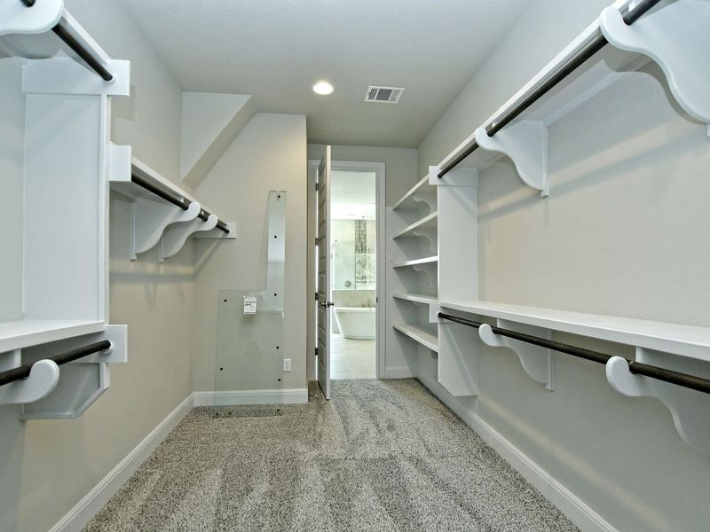Representative furnished interior of a home built from the Madera II by Giddens Homes in Scofield Farms Estates, Georgetown (Image 232).