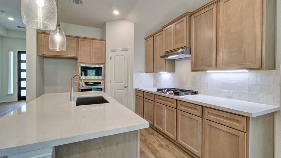 Furnished interior view inside a new home in The Crossvine, Schertz (Image 6).