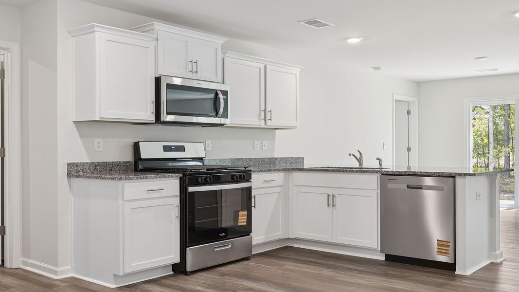 Furnished interior view inside a new home in Bentley Park, Greenwood (Image 6).