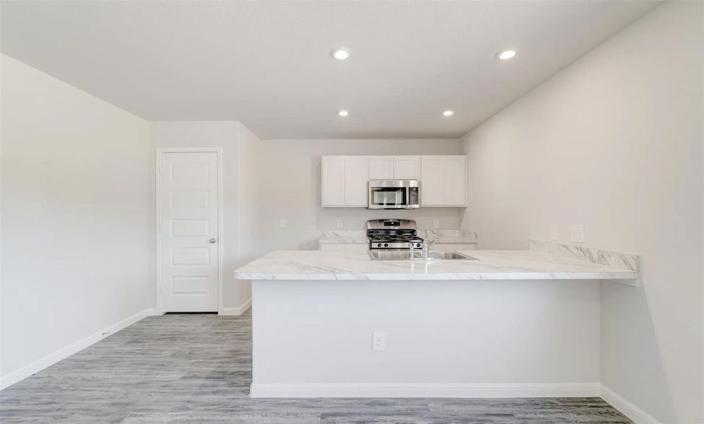 Furnished interior view inside a new home in Stoney Ridge, Hudson (Image 3).