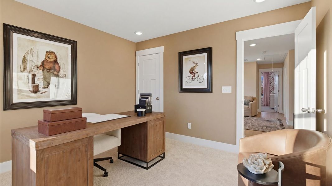 Tasteful study offering a quiet, elegant workspace in this vibrant Greenville townhome at Pelham Crossing