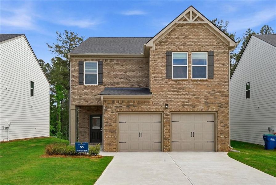 Front exterior of a new home in Creekbend Overlook, South Fulton, GA, highlighting curb appeal (Image 2). Front exterior of a new home in Creekbend Overlook, South Fulton, GA, highlighting curb appeal (Image 2).