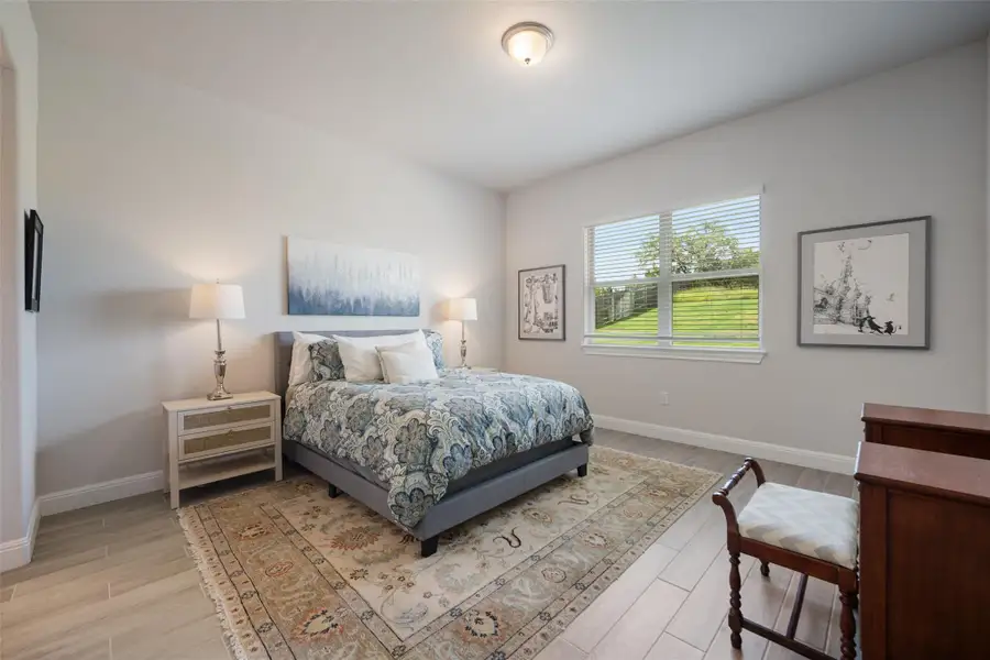 Bedroom featuring light wood-type flooring