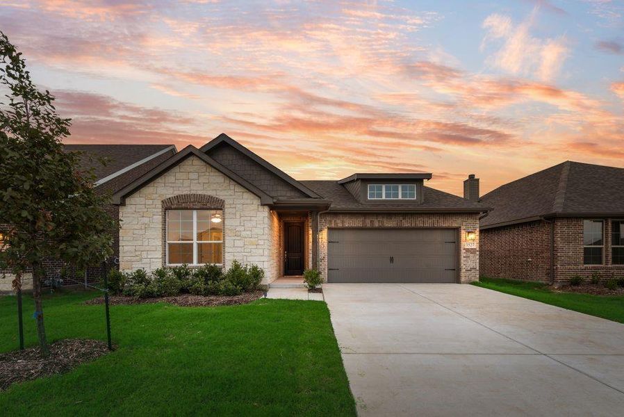 Front exterior of a new home in Liberty Pointe, Gainesville, TX, highlighting curb appeal (Image 18).