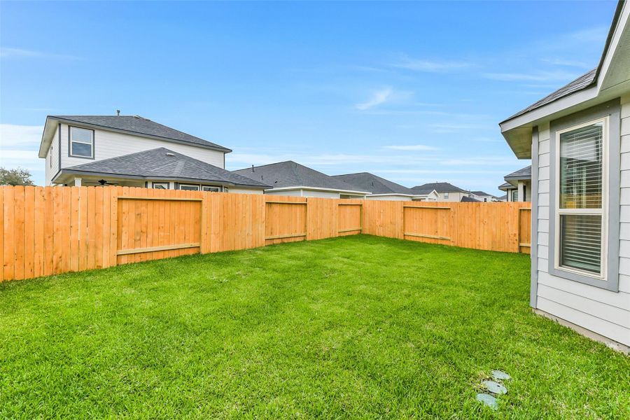 Exterior details and patio area of a home in , Houston (Image 24).