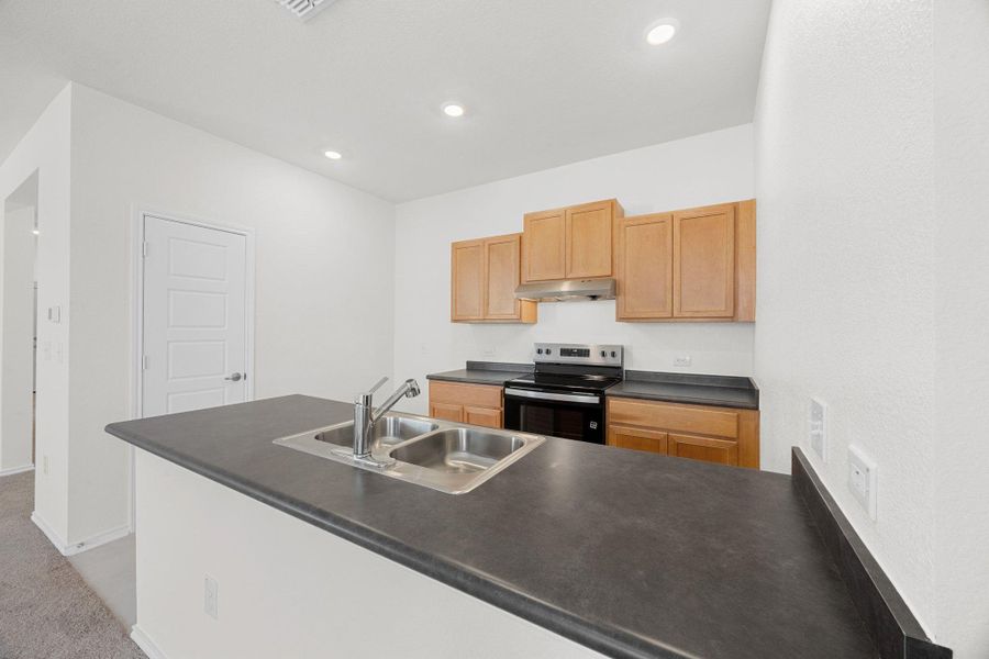 Furnished interior view inside a new home in Creekside at Estancia, Austin (Image 6).