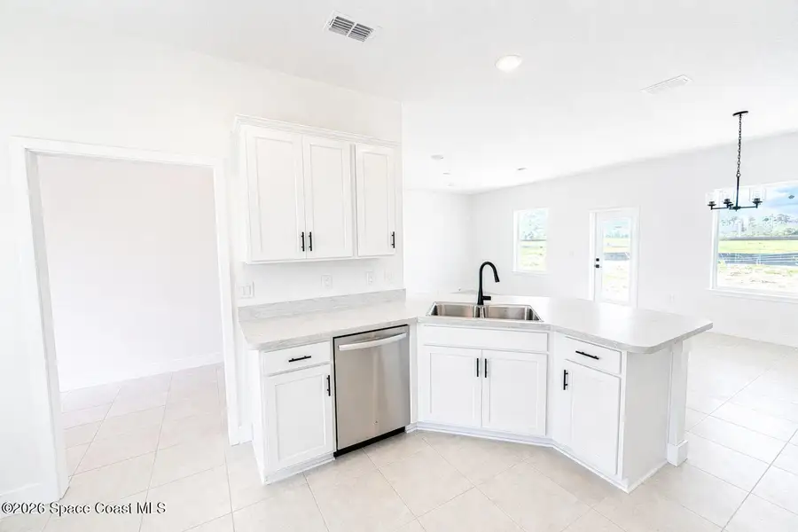 Furnished interior view inside a new home in St. John's Preserve, Palm Bay (Image 3).
