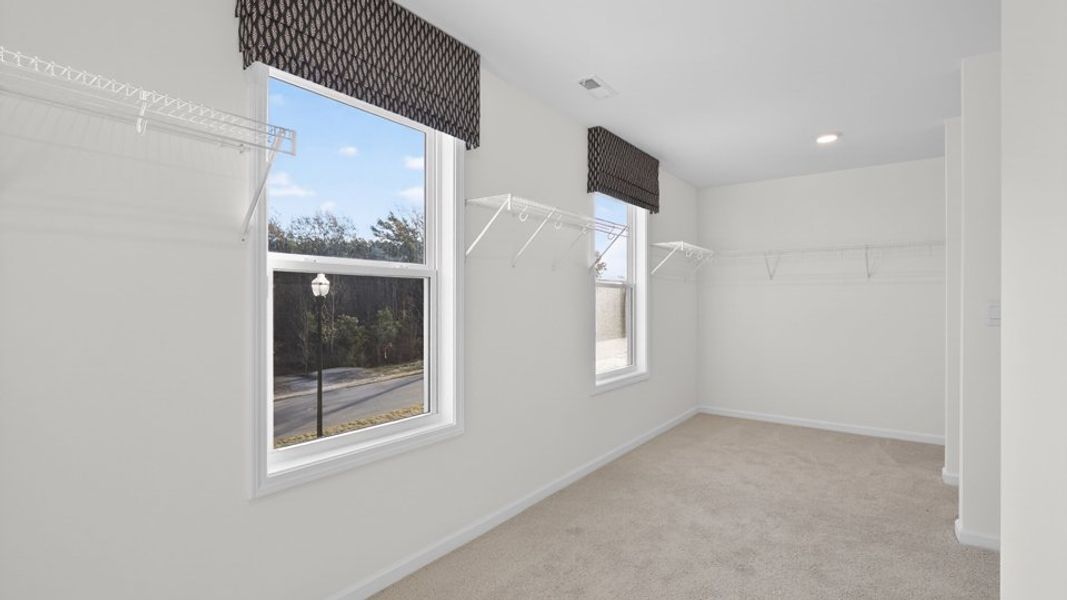 Representative unfurnished interior of a home built from the Norman by D.R. Horton in The Grove at Winston Pointe, Clayton (Image 21). Representative unfurnished interior of a home built from the Norman by D.R. Horton in The Grove at Winston Pointe, Clayton (Image 21).