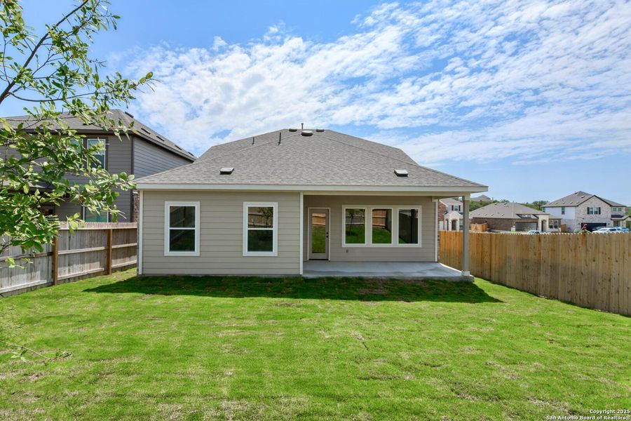 Front exterior of a new home in Arcadia Ridge, San Antonio, TX, highlighting curb appeal (Image 2). Front exterior of a new home in Arcadia Ridge, San Antonio, TX, highlighting curb appeal (Image 2).