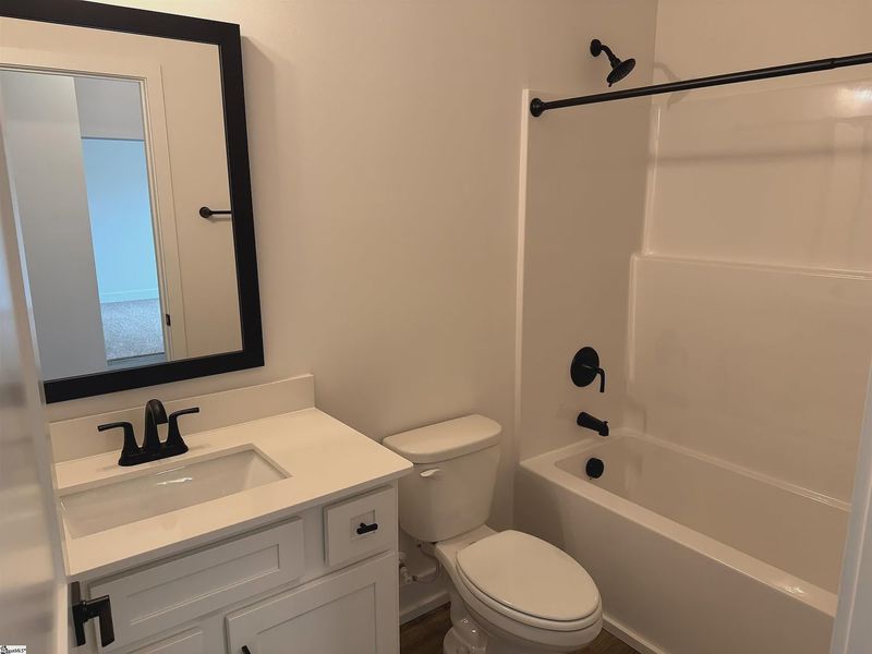 Furnished interior view inside a new home in Hidden Lake Estates, Greenville (Image 6).
