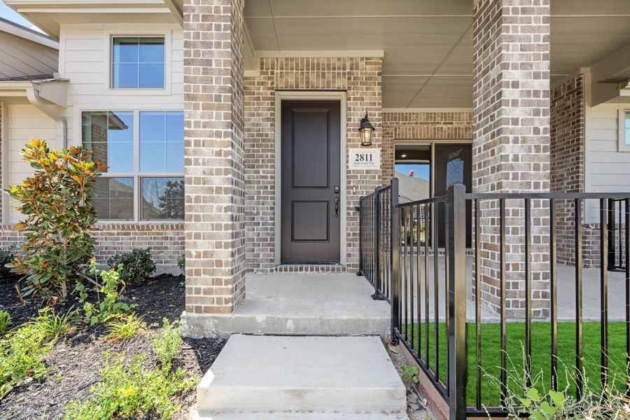 Exterior details and patio area of a home in Woodbridge Villas, Wylie (Image 29).