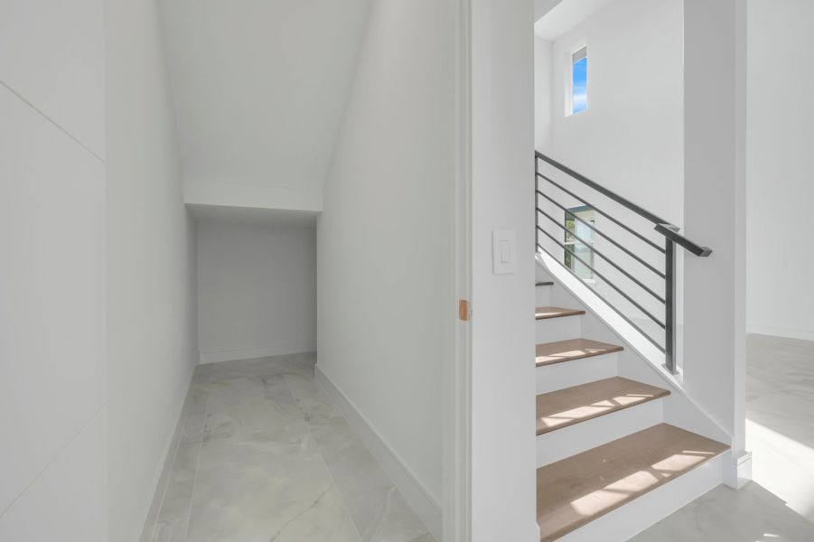 Representative unfurnished interior of a home built from the Courtyard 50 by ABD Development in Hampton Green at Providence, Davenport (Image 49).