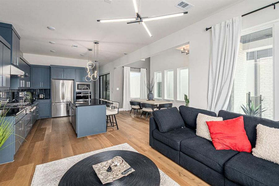 Living area with light wood-type flooring