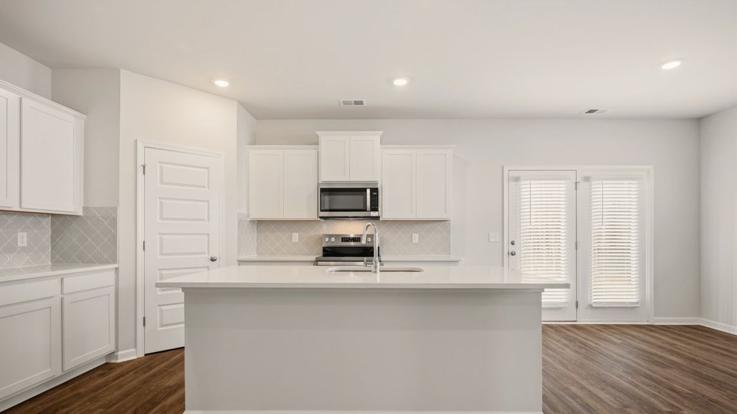 Representative furnished interior of a home built from the Somerset by D.R. Horton in Oakchase at Hampton, Hampton (Image 5).