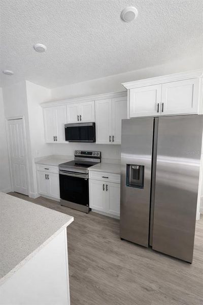 Furnished interior view inside a new home in , Citrus Springs (Image 3). Furnished interior view inside a new home in , Citrus Springs (Image 3).