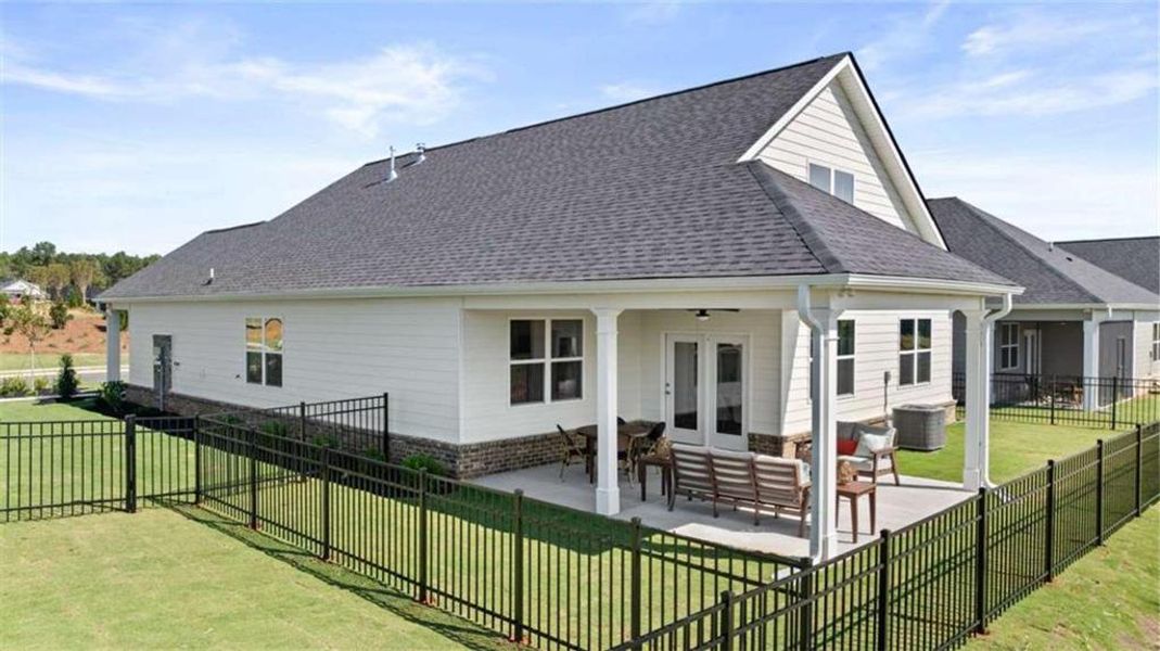 Exterior details and patio area of a home in Oak Ridge Meadows, Locust Grove (Image 4).