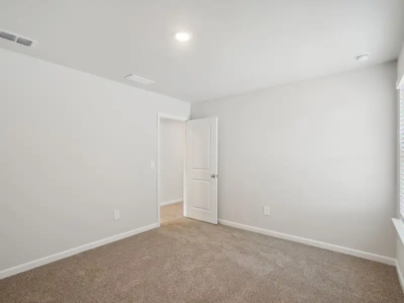 Spacious, unfurnished interior of a new home in Martin Springs - Cottage Series, Lawrenceville (Image 18).