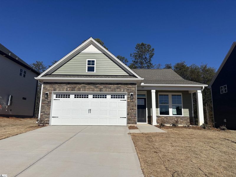 Front exterior of a new home in Shiloh Trail, Wellford, SC, highlighting curb appeal (Image 25).
