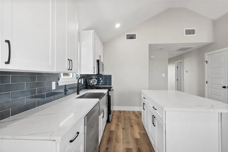 Furnished interior view inside a new home in , San Leon (Image 5).