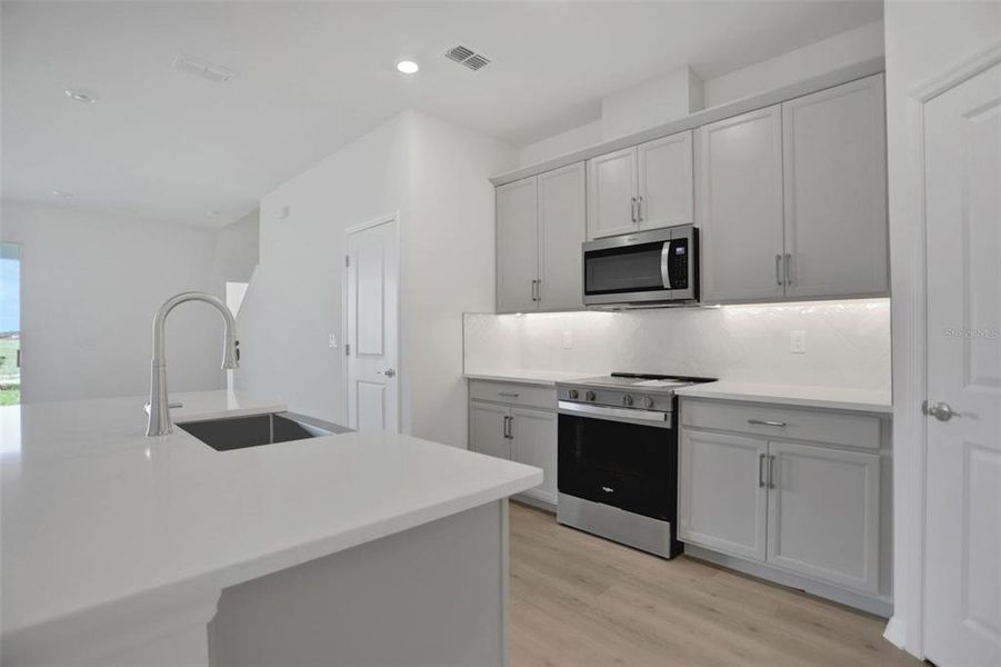 Furnished interior view inside a new home in Seaire, Parrish (Image 13).