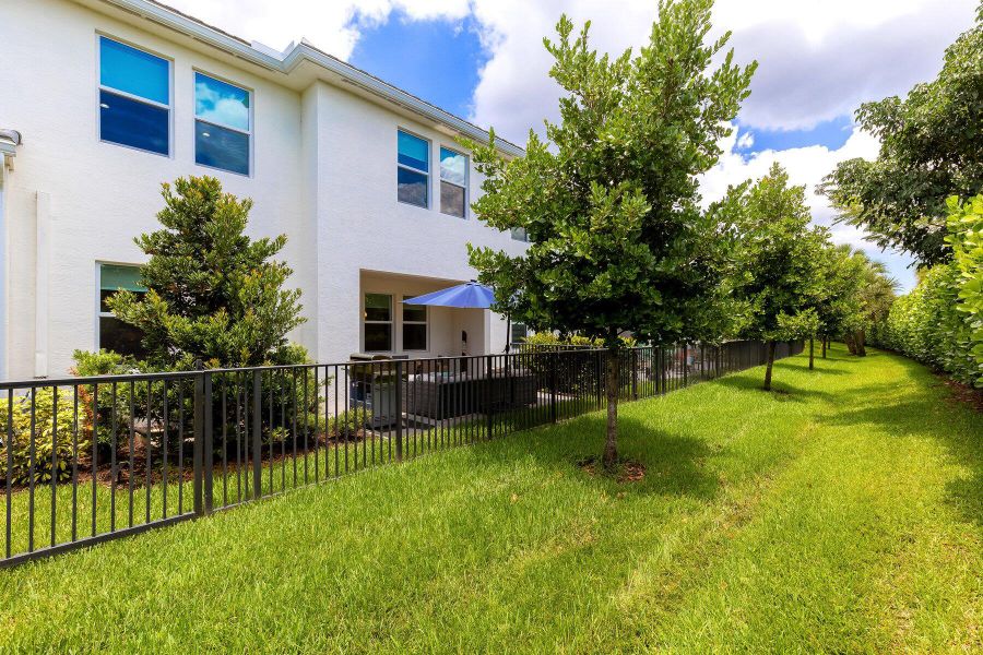 Front exterior of a new home in , Westlake, FL, highlighting curb appeal (Image 18).