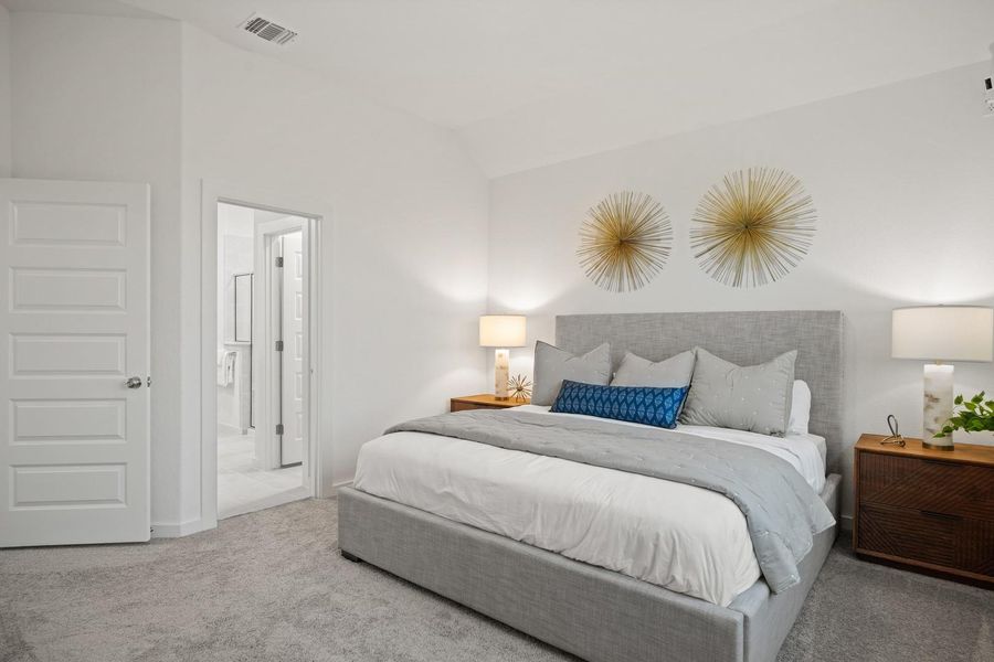 Primary suite in the Oak home plan by Trophy Signature Homes – REPRESENTATIVE PHOTO