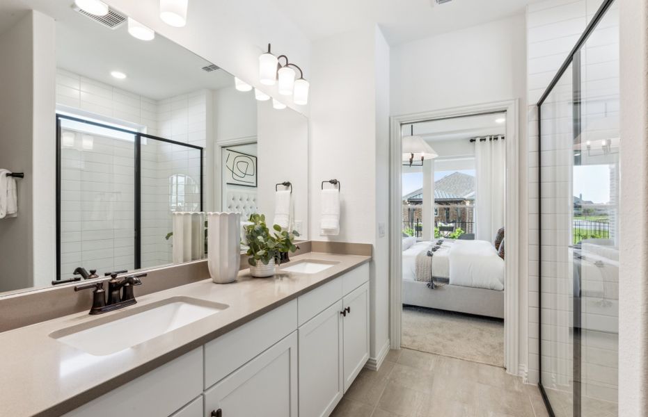 Owner's bath with double vanity and large shower