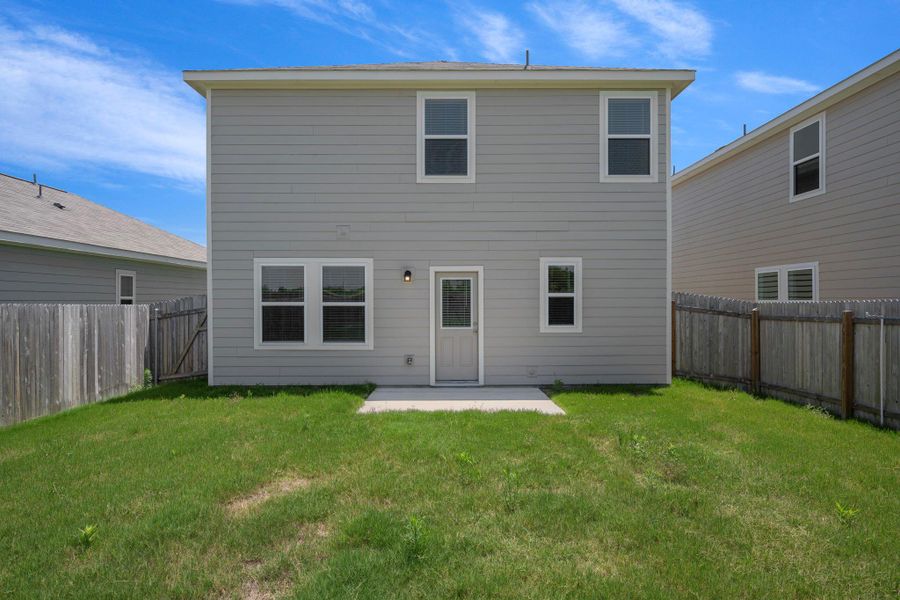 Front exterior of a new home in Cottonwood Farms, Hutto, TX, highlighting curb appeal (Image 17). Front exterior of a new home in Cottonwood Farms, Hutto, TX, highlighting curb appeal (Image 17).
